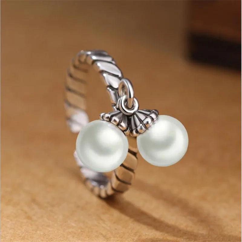 Silver Pearl Twist Ring – Elegant, retro, and adjustable.
