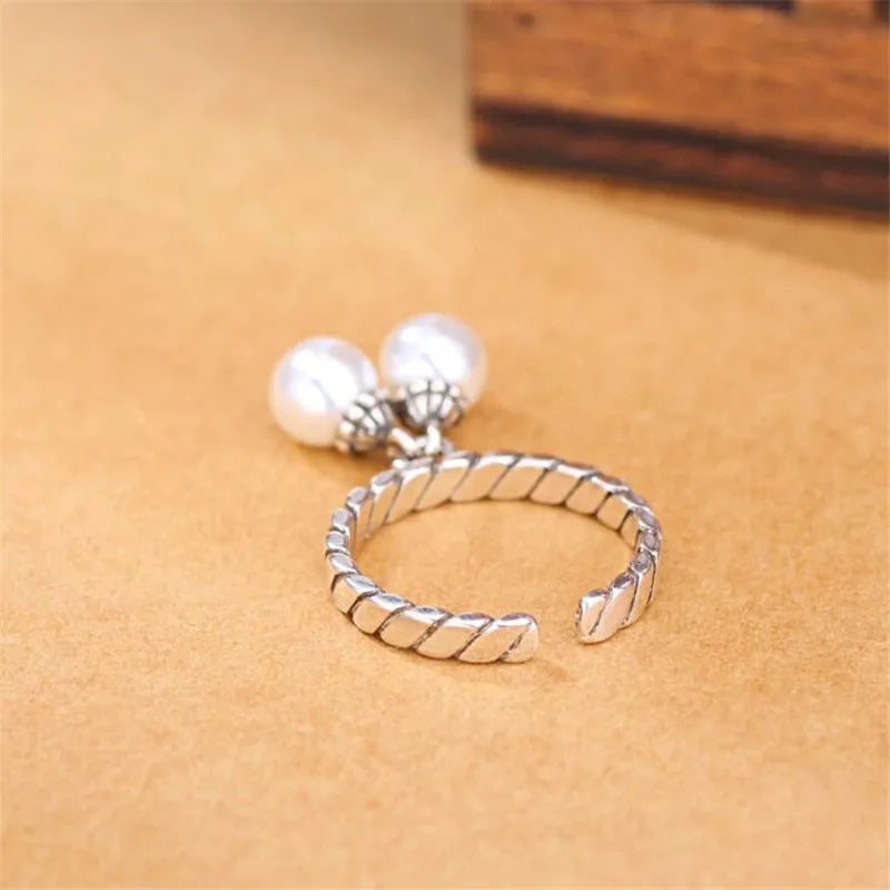 Silver Pearl Twist Ring – Elegant, retro, and adjustable.